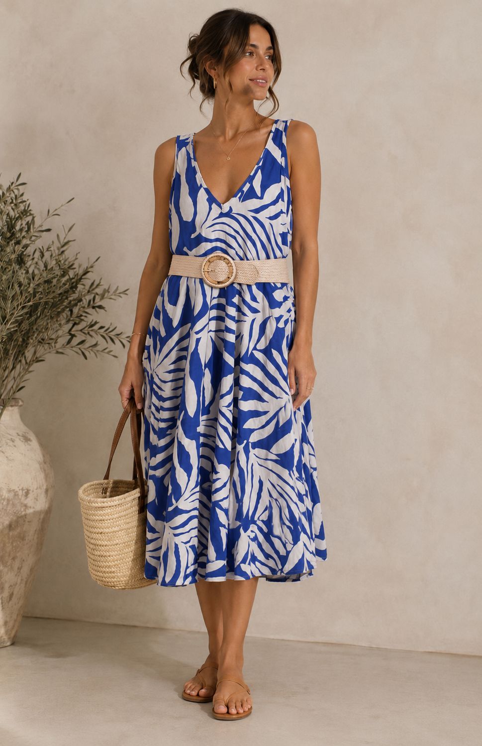 Blauwe midi jurk met witte print – luchtige zomerjurk