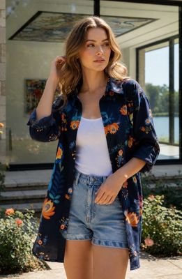 Luchtige oversized tuniekjurk met bloemenprint – vervaardigd uit 100% katoen.