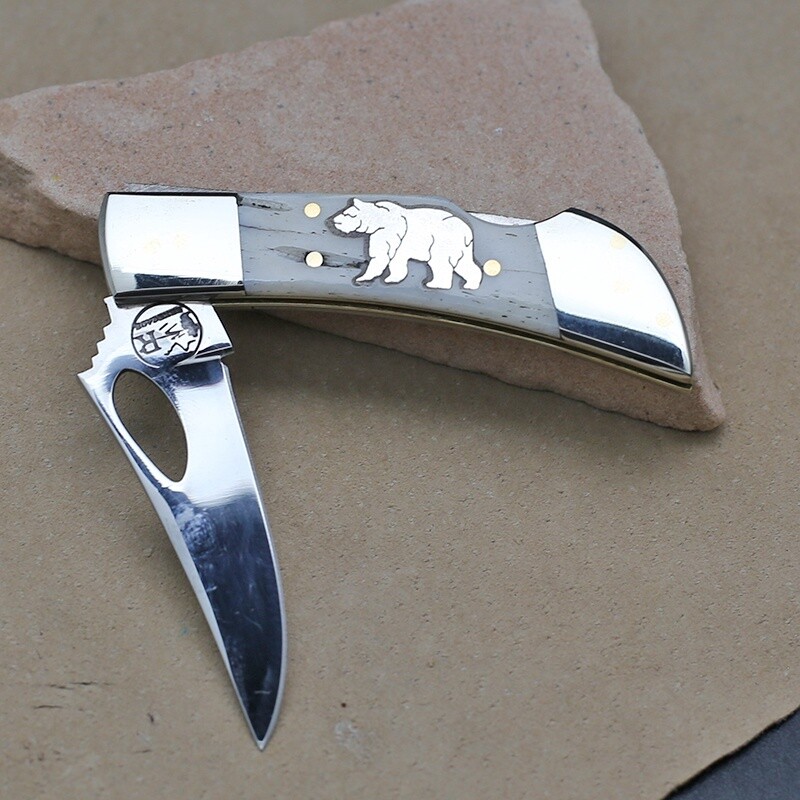 Silver bear inlay pocket knife