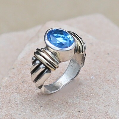 14KT Gold & Silver w/ oval blue faceted stone