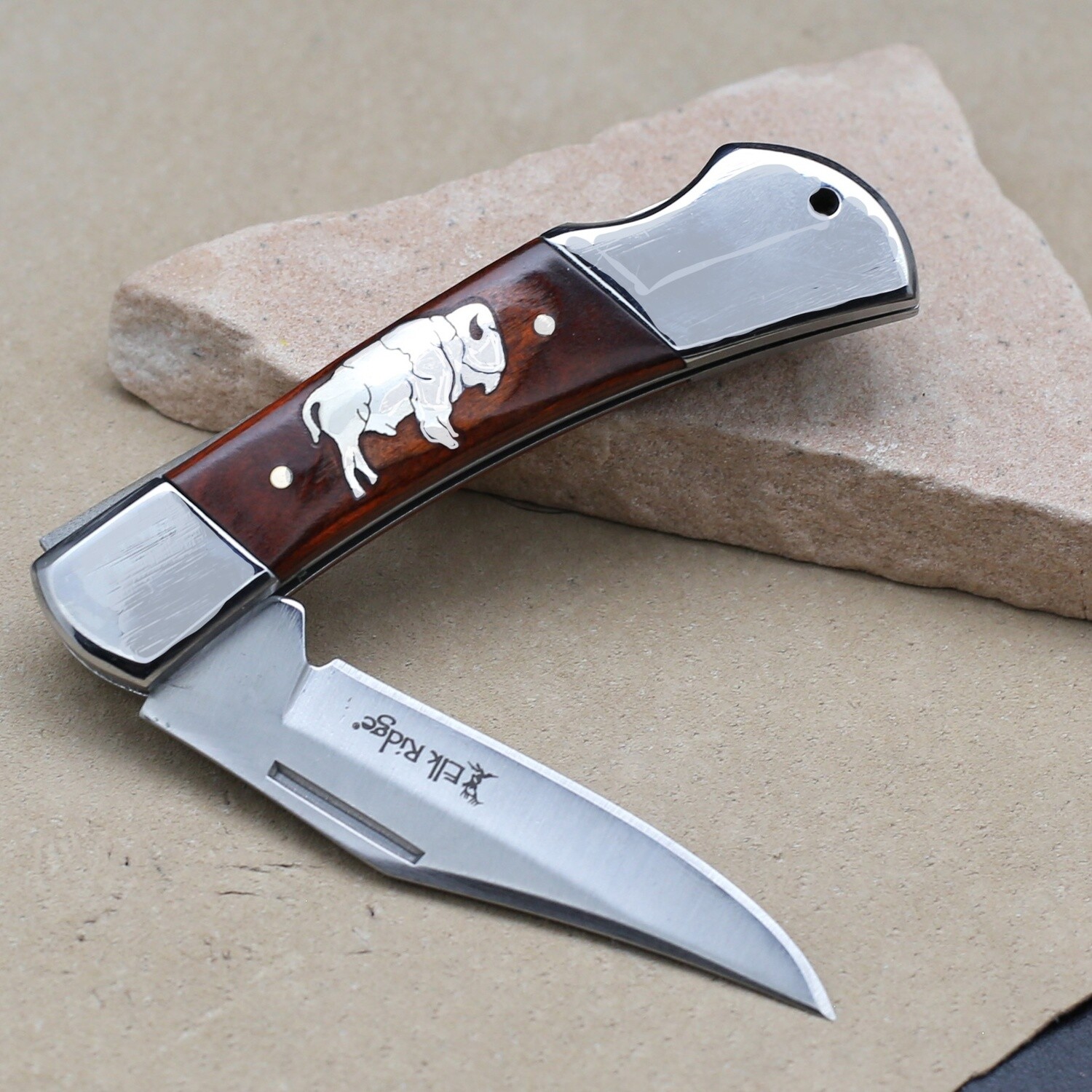 Single blade knife w/ inlay buffalo image