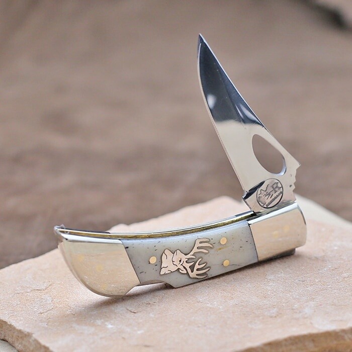 Silver deer head inlay pocket knife