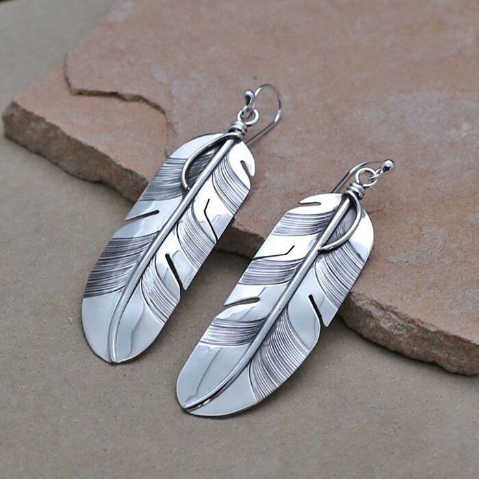 Feather dangle earrings