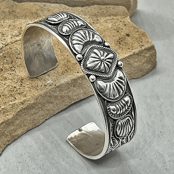 Navajo bracelet w/ heavy stamp work by Tsosie White