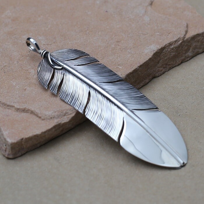Large feather pendant by artist Lena Platero