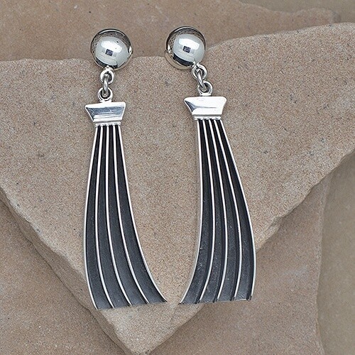 Long curved channel dangle earrings