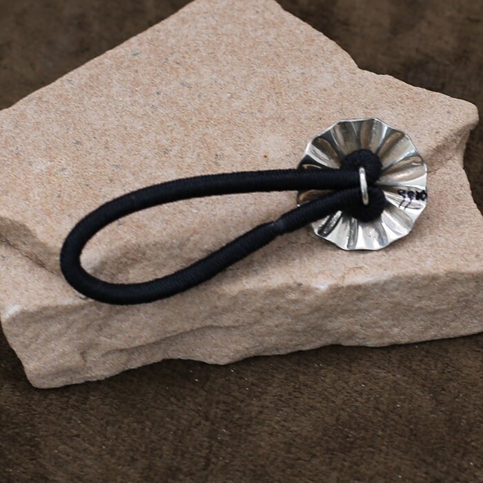 Round silver hair tie