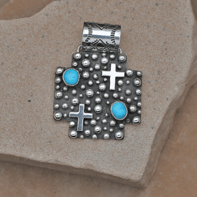 Cross pendant with Rain Drop design