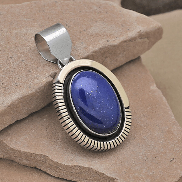 Large oval lapis pendant with gold overlay