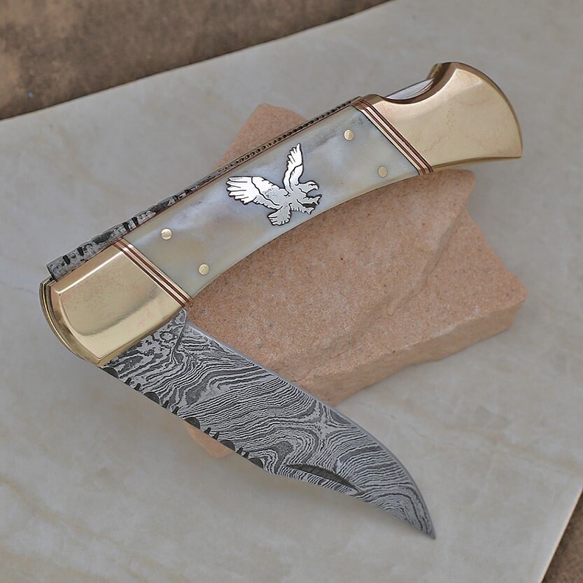 Large single Damascus steel blade knive