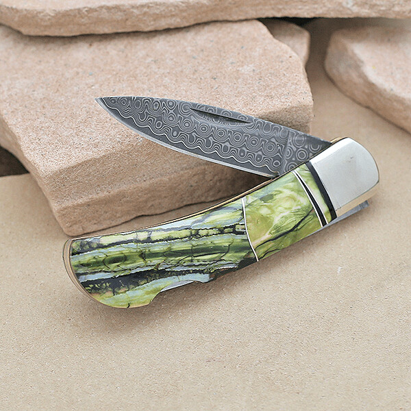 Damascus blade pocket knife w/Mineralized tooth inlay