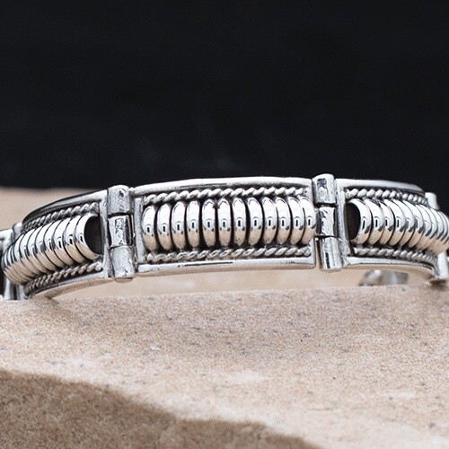 5-link bracelet by Navajo artist Tom Charley