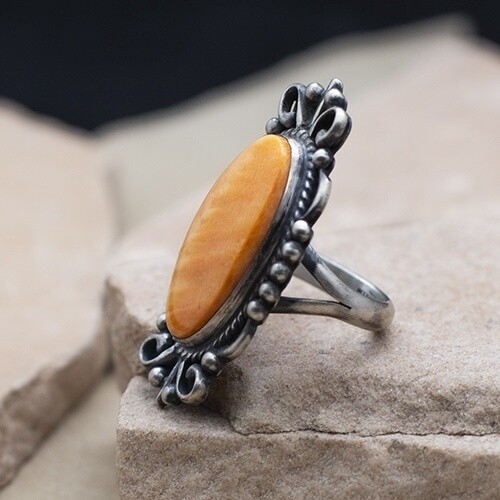 Silver scroll design spiny oyster shell ring