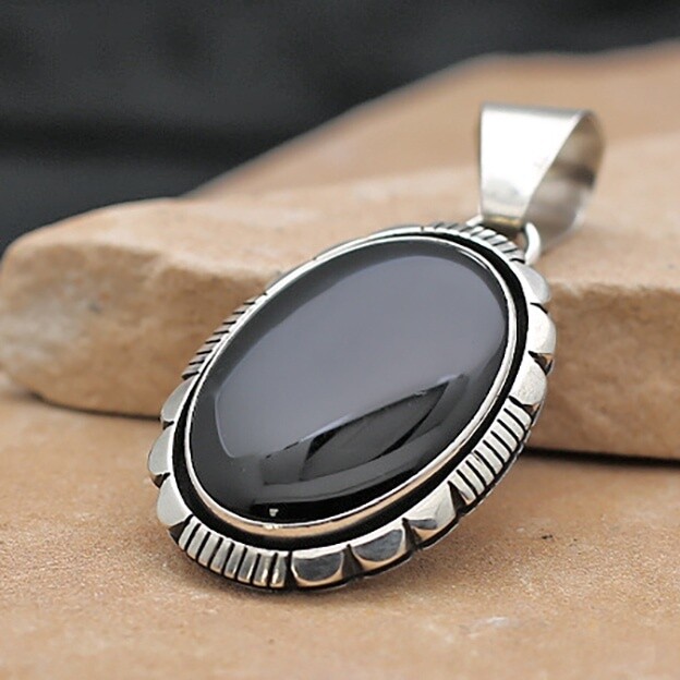 Medium sized oval black onyx pendant