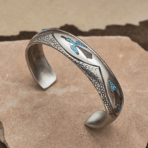 Small chip inlay bracelet by artist Tommy Singer