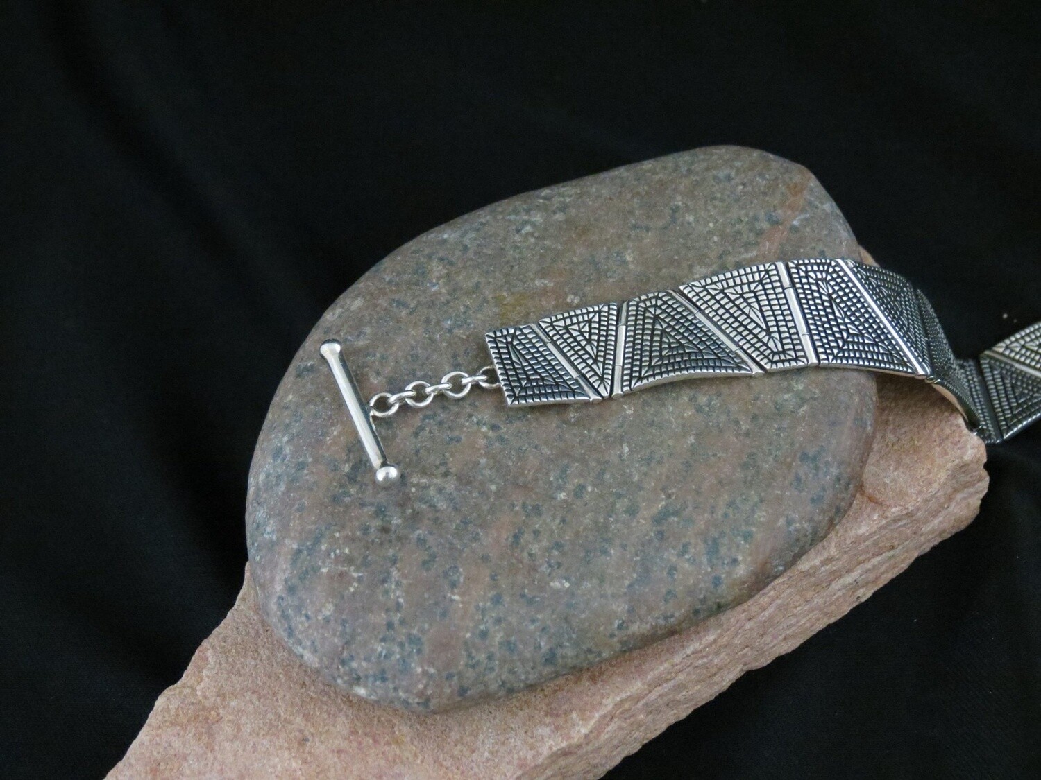 Basket weave pattern link bracelet designed by Elgin Tom