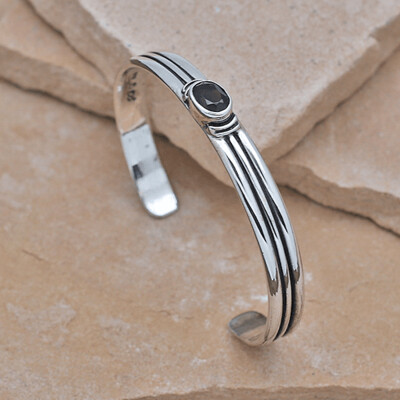 Thin sterling silver bracelet w/ oval smoky gemstone