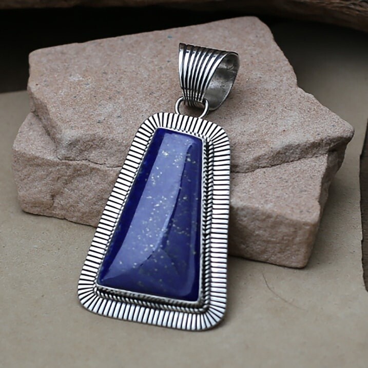 BC 1327  Albert Jake &quot;cold chisel&quot; pendant
