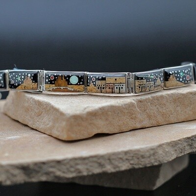 Link bracelet with adobe pueblo design