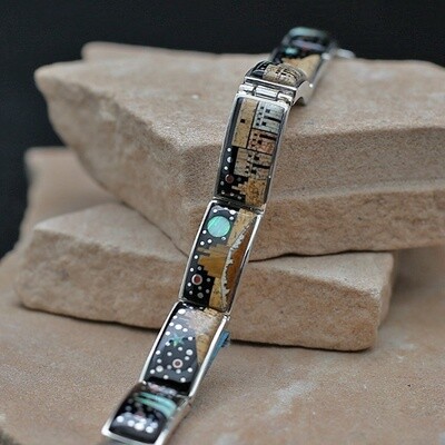 Link bracelet with adobe pueblo design