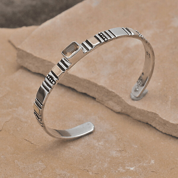 Thin silver bracelet w/ 14kt gold accents &amp; yellow gemstone