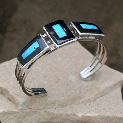 Inlay bracelet by artist Harlan Coonsis