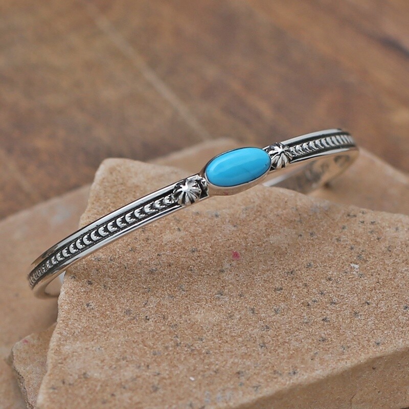 Oval single stone cuff bracelet