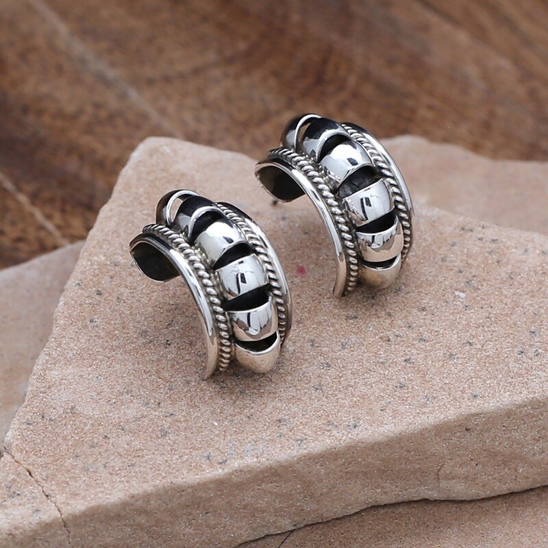 Domed silver hoop earrings