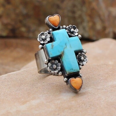 Turquoise cross ring with orange spiny hearts