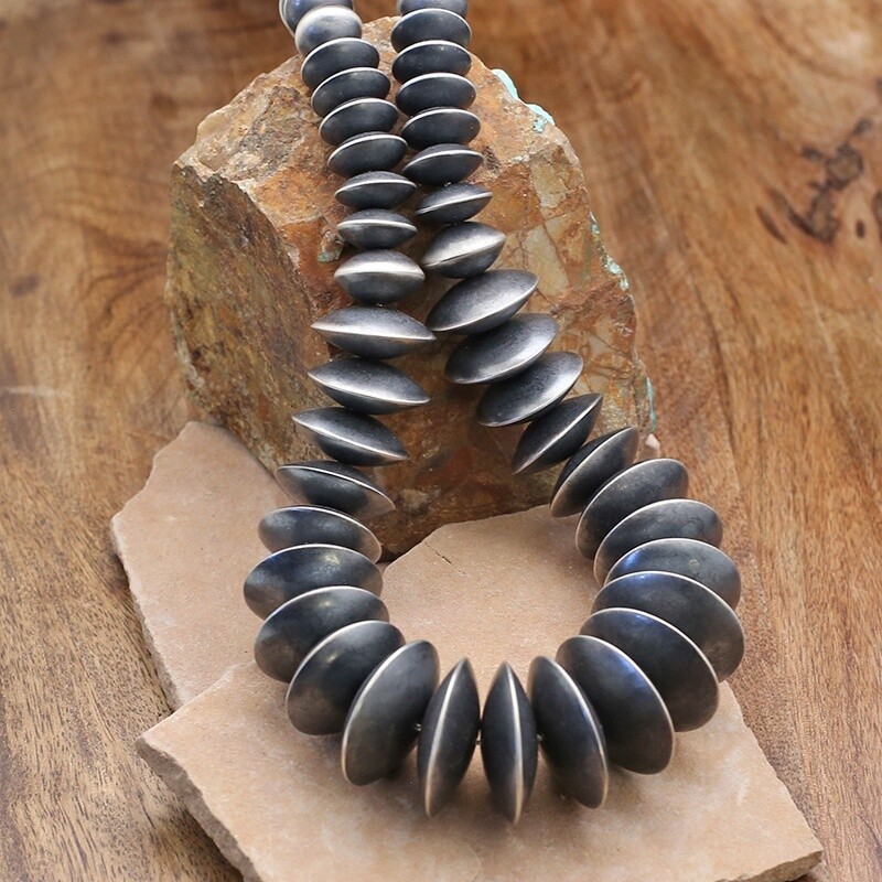 Heavy saucer style Navajo pearls