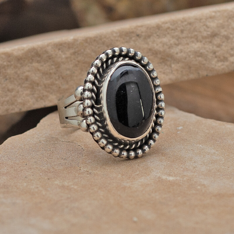 Oval black onyx ring w/ bead bezel