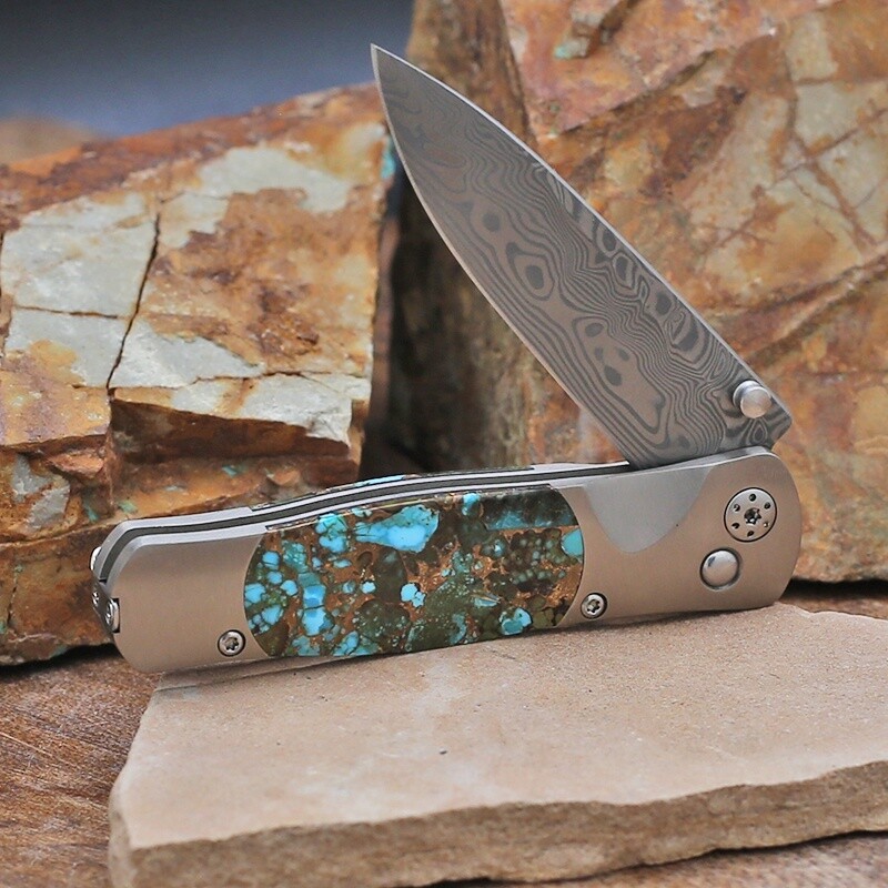 Composite turquoise inlay folding knife w/Damascus blade