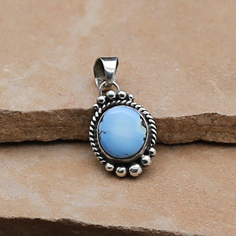 Small round pendant w/ Golden Hills turquoise
