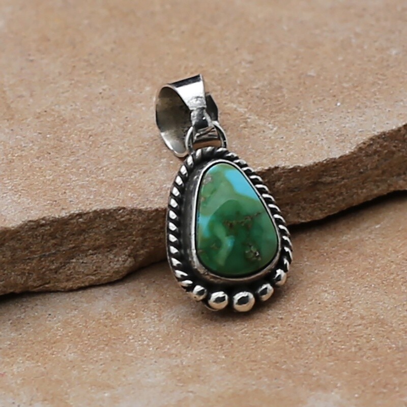 Small tear dropped shaped pendant w/Sonoran gold turquoise