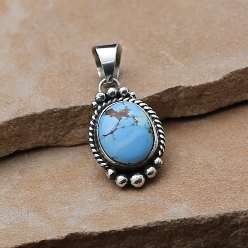 Small oval Golden Hills turquoise pendant