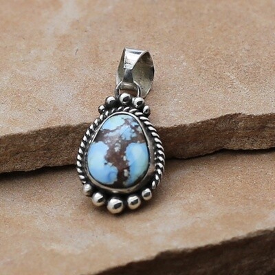 Small tear drop shaped Golden Hills turquoise pendant