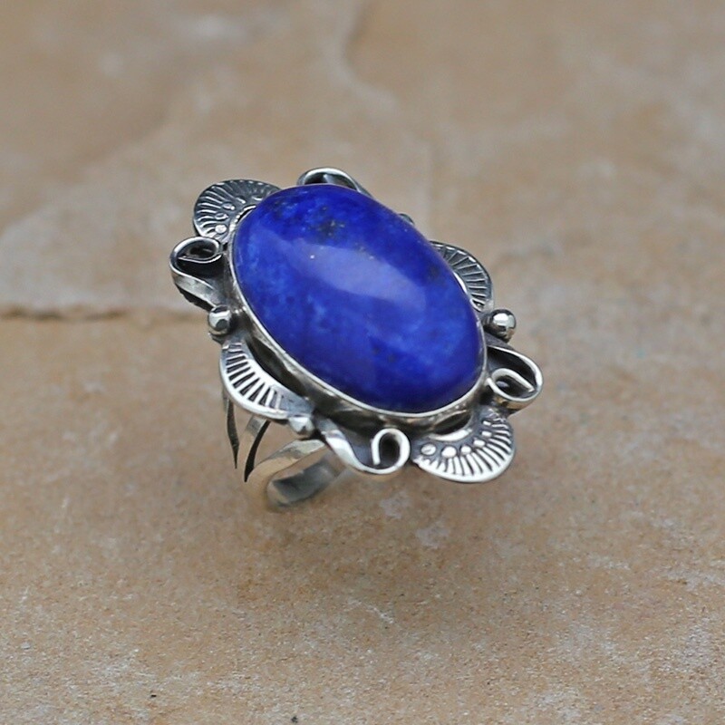 Uniquely stamped ring with oval Lapis stone