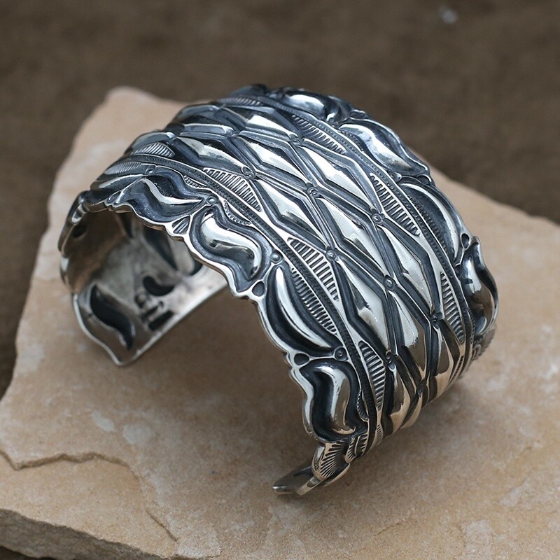 Wide Navajo cuff bracelet by artist Darryl Becenti