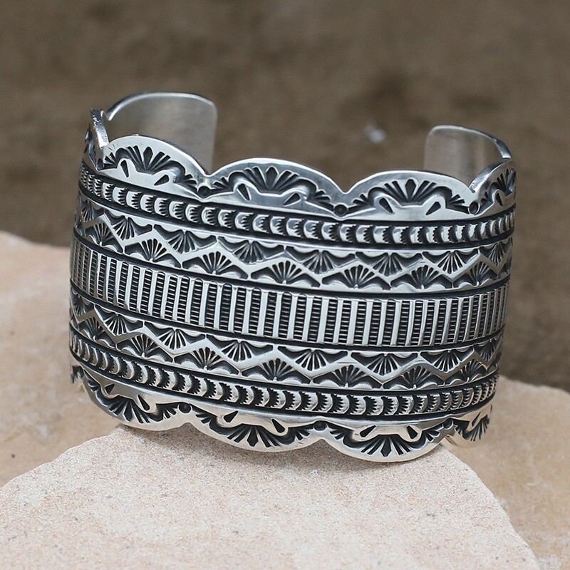 Wide Navajo bracelet by artist Happy Piaso
