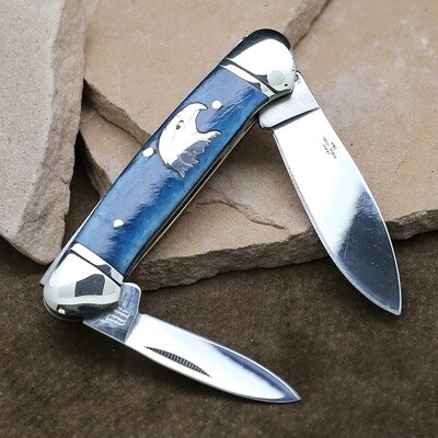 Blue wood double knife w/ eagle head inlay