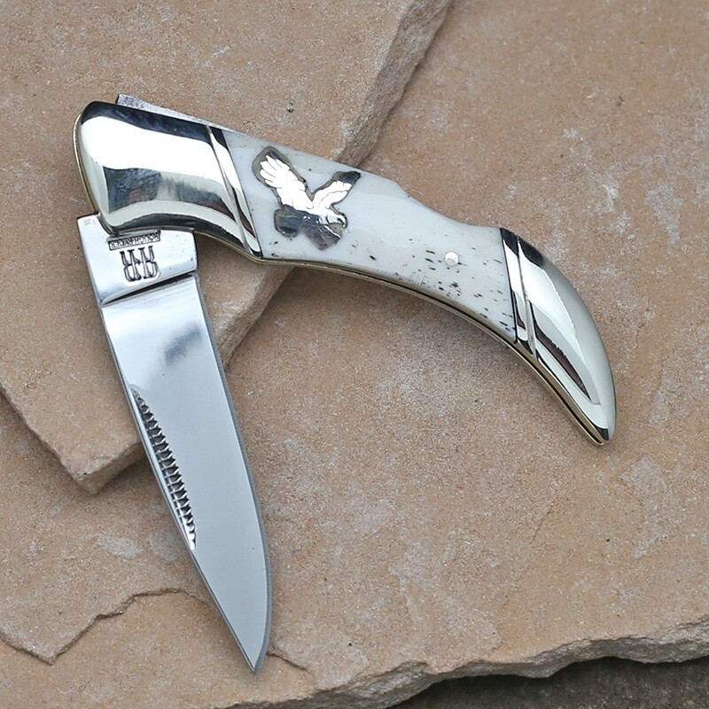 Antler handle pocket knife w/ silver flying eagle inlay