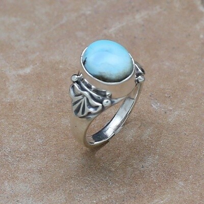 Silver cast ring with golden hills turquoise