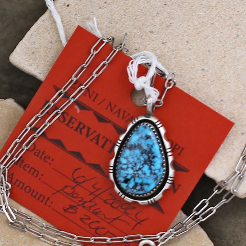 Pawn Jewelry-Navajo pendant w/Kingman spider wed turquoise