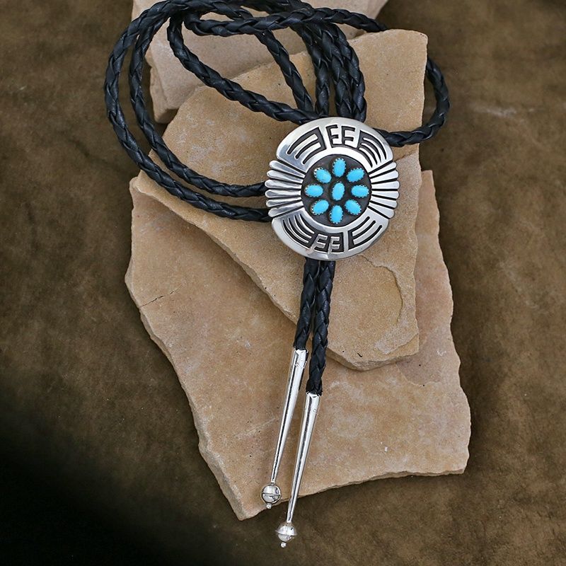 Round Navajo bolo tie by Rosco Scott