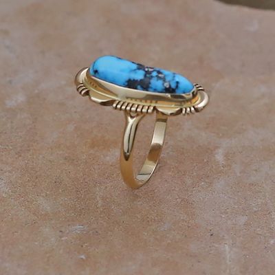 Oval 14kt gold ring w/ Kingman turquoise