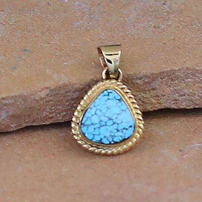 Mini 14kt gold pendant w/ lite blue kingm