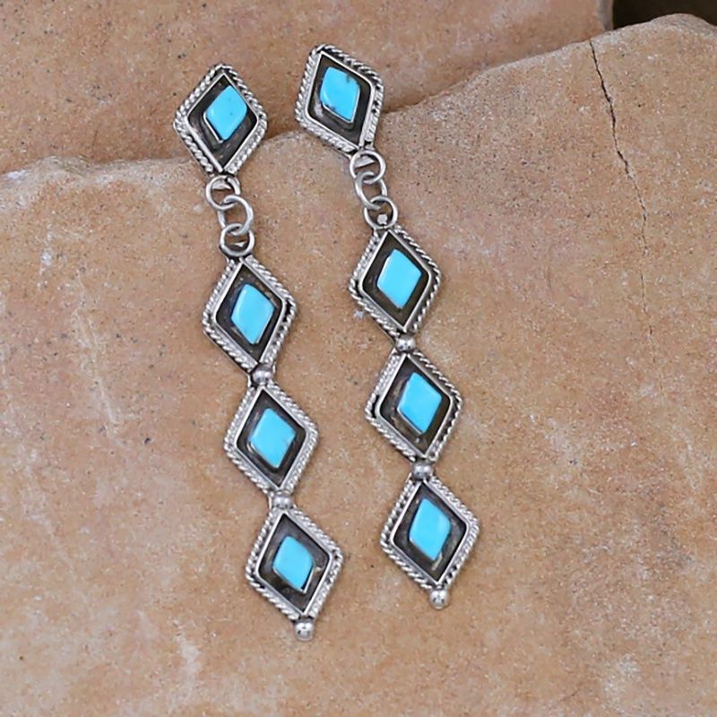 Long diamond shaped stick earrings