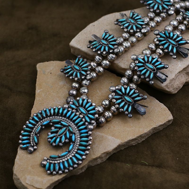 Reflecting On The History Of Native American Squash Blossom Necklaces