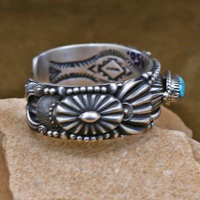 Delbert Gordon cuff bracelet w/ small oval turquoise stone