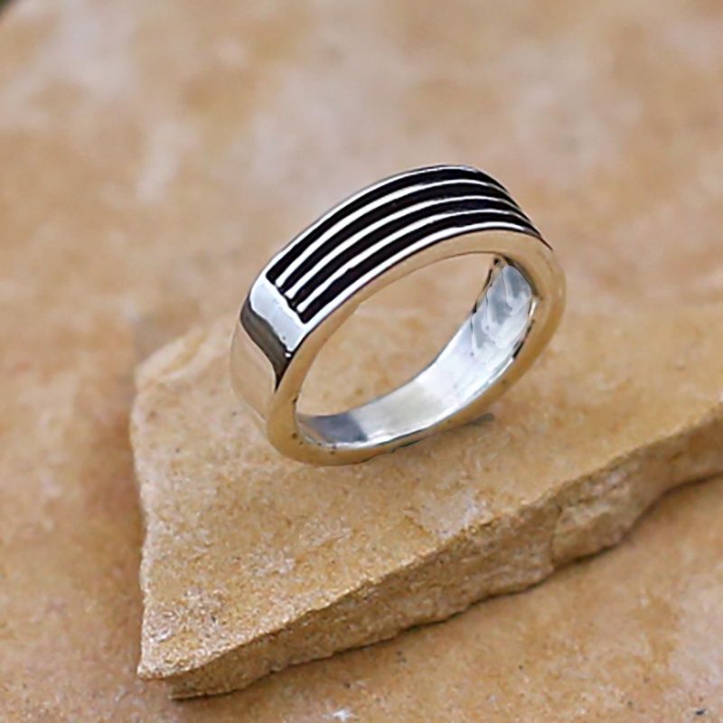 Silver channel ring by artist Francis Jones